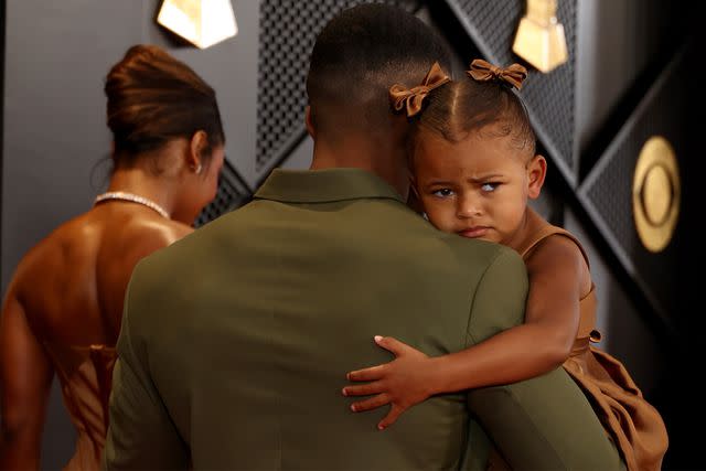 <p>Matt Winkelmeyer/Getty</p> Victoria Monét, John Gaines and their daughter Hazel