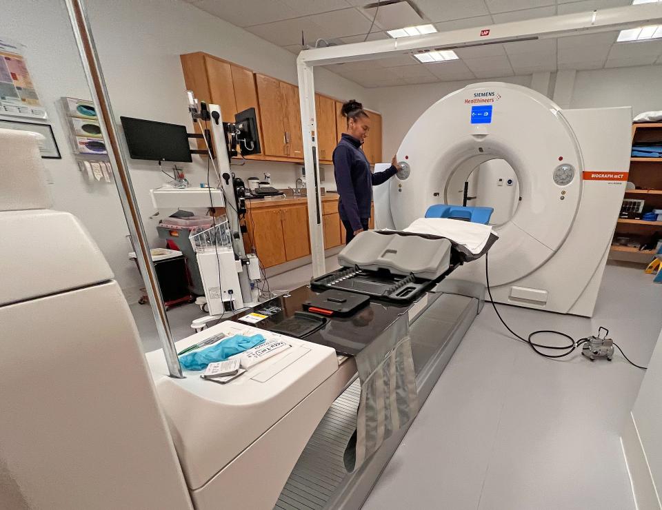 Amanda Carroll RT operated a PET/CT scanner at the Cleveland Clinic Cancer Center in Mansfield.