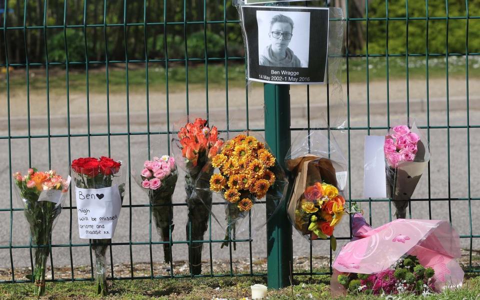 Tributes have been left to Ben Wragge who died after he was shot with an air rifle on Sunday. Pictured: Tributes at the Thurston Community College - East News Press Agency