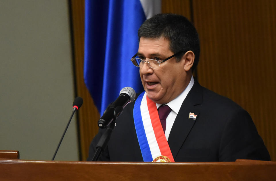Paraguay's President Horacio Cartes delivers the last annual legislative report before handing over his government, on July 1, 2018. - The elected President Mario Abdo Benitez will take over the goverment the next 15 August in Auncion. (Photo by NORBERTO DUARTE / AFP)        (Photo credit should read NORBERTO DUARTE/AFP via Getty Images)