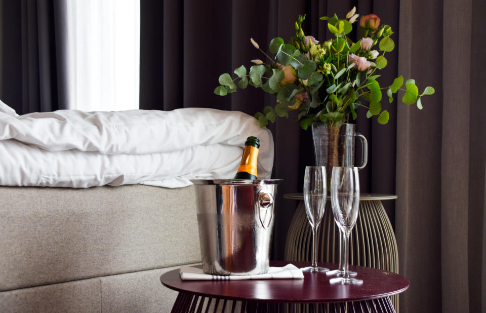 Champagne and glasses in a hotel room