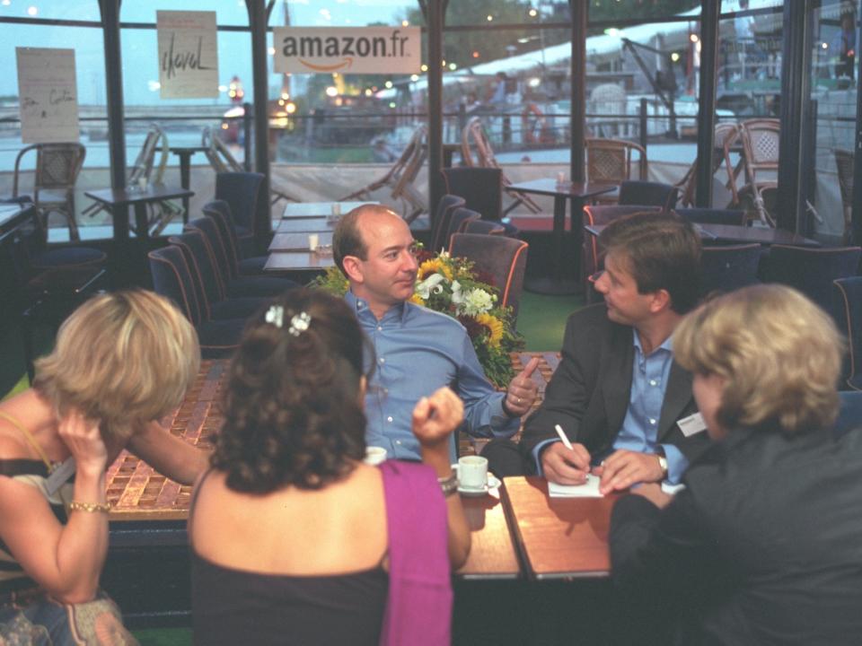 Jeff Bezos at a restaurant meeting with four other people