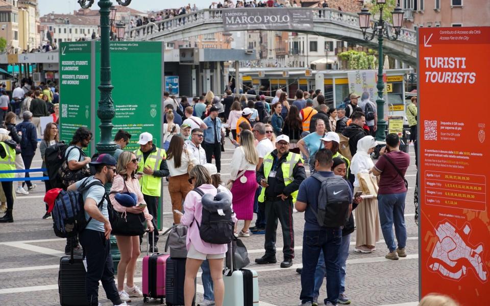 Tourists entering Venice