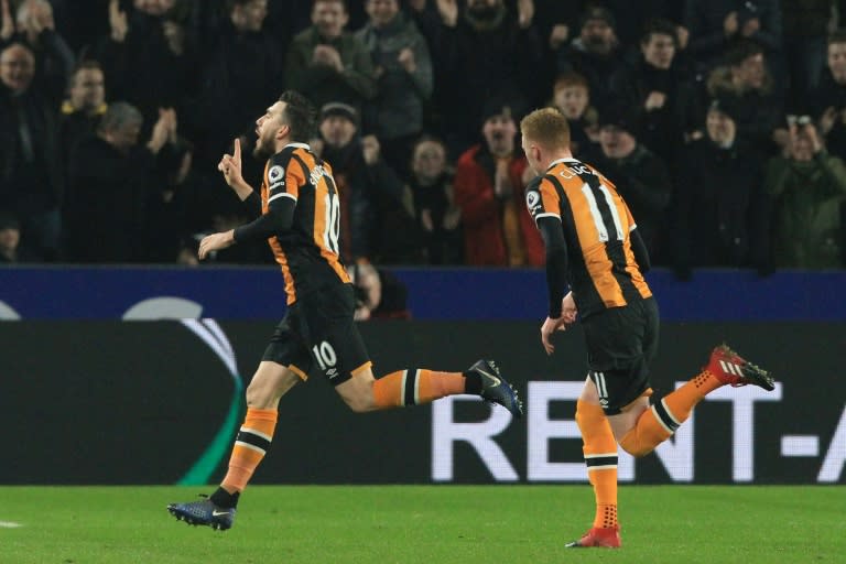 Hull City's Robert Snodgrass (L) celebrates after scoring a goal during their English Premier League match against Everton, at the KCOM Stadium in Kingston upon Hull, on December 30, 2016