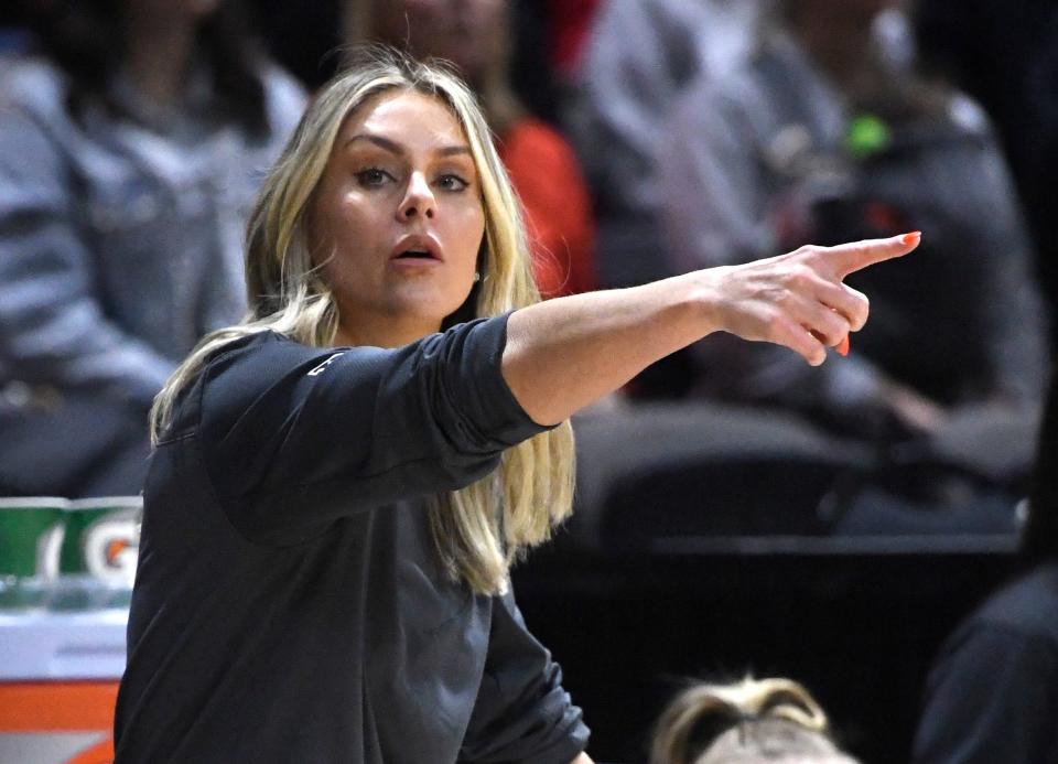 Oklahoma State's head coach Jacie Hoyt gestures during the game against Texas in the Big 12 basketball tournament semifinal, Saturday, March 11, 2023, at Municipal Auditorium in Kansas City, Mo. 