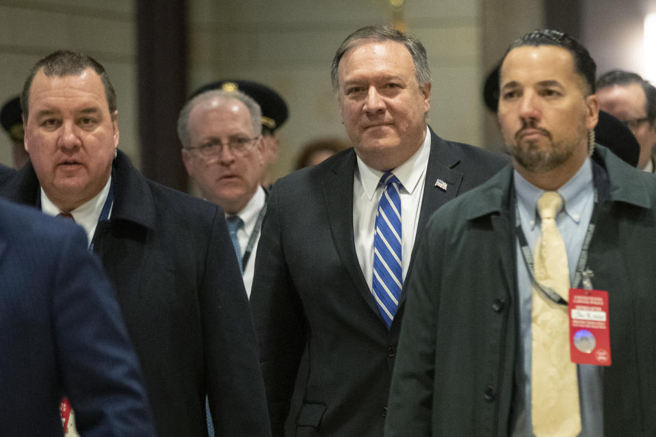 Secretary of State Mike Pompeo, walks towards the Senate after briefing members of Congress on last week's targeted killing of Iran's senior military commander Gen. Qassem Soleimani, Wednesday, Jan. 8, 2020, on Capitol Hill in Washington. (AP Photo/Manuel Balce Ceneta)