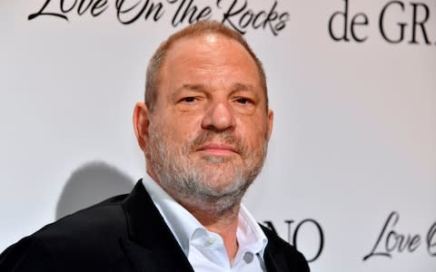 This file photo taken on May 23, 2017 shows US film producer Harvey Weinstein posing during a photocall as he arrives to attend the De Grisogono Party on the sidelines of the 70th Cannes Film Festival - Credit: AFP