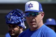 Israel Olympic baseball manager Eric Holtz watches his team practice at Salt River Fields spring training facility, Wednesday, May 12, 2021, in Scottsdale, Ariz. Israel has qualified for the six-team baseball tournament at the Tokyo Olympic games which will be its first appearance at the Olympics in any team sport since 1976. (AP Photo/Matt York)