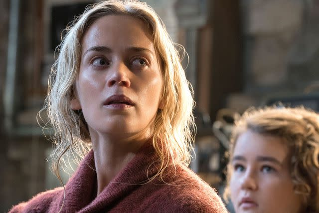 Jonny Cournoyer/Paramount Pictures Emily Blunt and Millicent Simmonds in 'A Quiet Place'