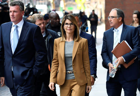 FILE PHOTO: Actor Lori Loughlin leaves the federal courthouse after facing charges in a nationwide college admissions cheating scheme in Boston, Massachusetts, U.S., April 3, 2019. REUTERS/Gretchen Ertl