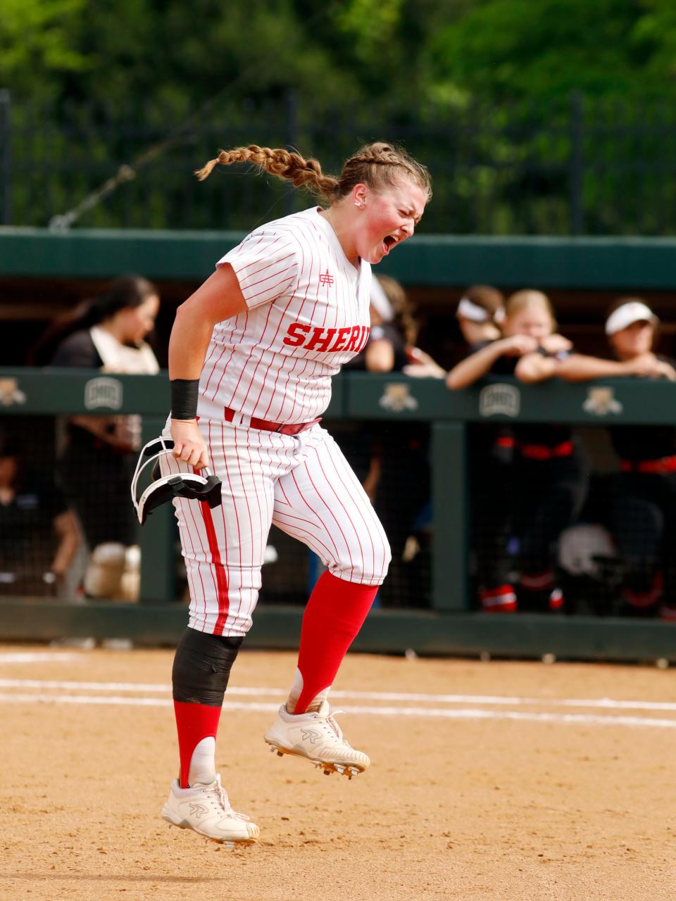 Cora Hall gets a excited after a strikeout during Sheridan's 2-1 loss to Circleville Logan Elm in a Division II district final on Friday at Ohio University.