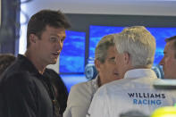 Former football player Tom Brady, left, tours the Williams Racing garage after a practice session ahead of the Formula One Miami Grand Prix auto race at the Miami International Autodrome, Friday, May 3, 2024, in Miami Gardens, Fla. (AP Photo/Wilfredo Lee)