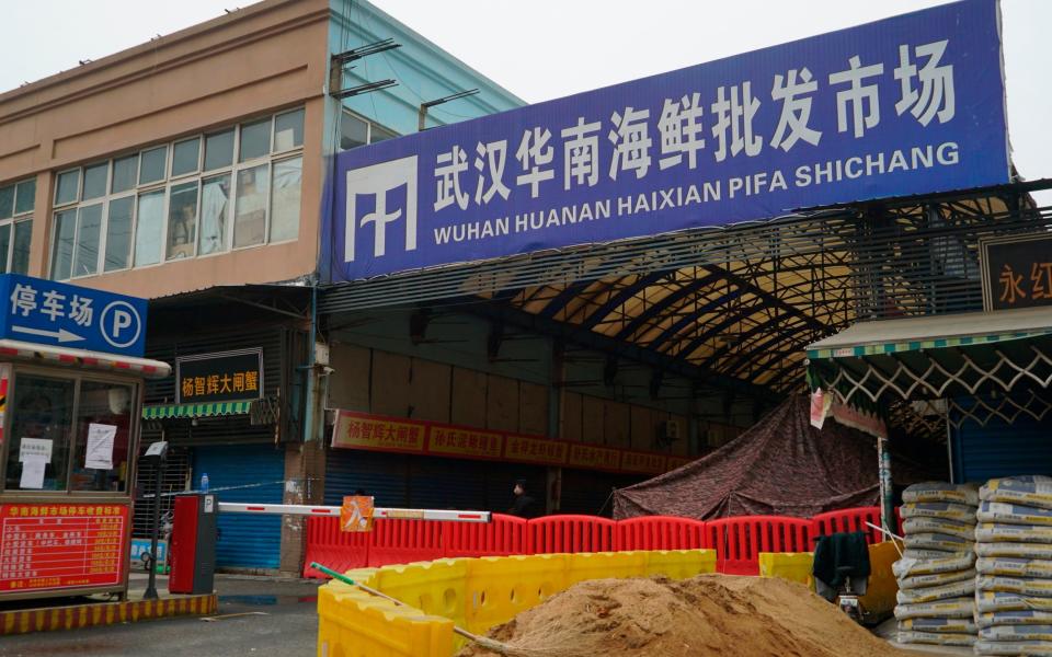 The Huanan Seafood Wholesale Market in Wuhan, pictured in January 2020, has been at the centre of a row over the origins of Covid-19 - Dake Kang