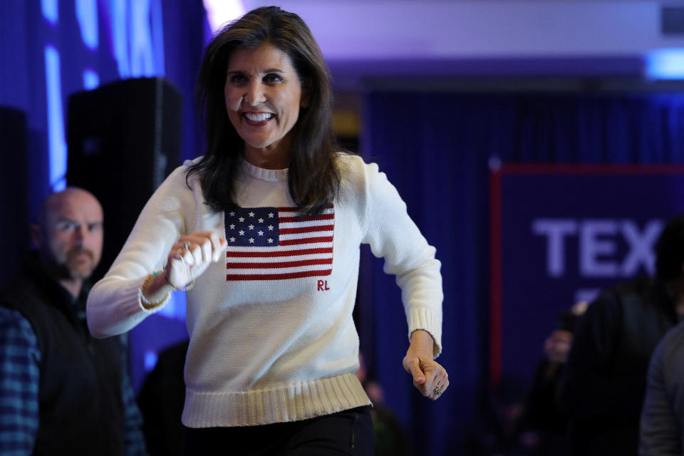 Republican presidential candidate and former U.S. Ambassador to the United Nations Nikki Haley takes the stage at a Get Out the Vote campaign rally ahead of the New Hampshire primary election in Nashua, New Hampshire, U.S., January 20, 2024.   REUTERS/Brian Snyder