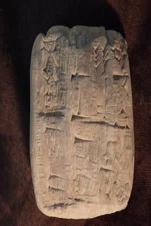 A cuneiform tablet, an ancient clay artifact that originated in modern-day Iraq is seen in this undated handout photo obtained by Reuters July 5, 2017. United States Attorney's Office Eastern District of New York/Handout via REUTERS