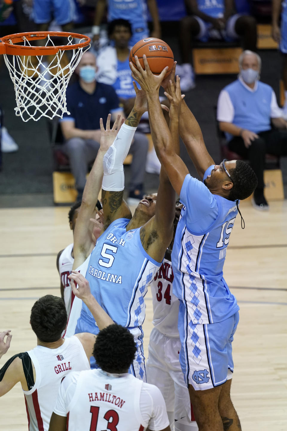 North Carolina forward Armando Bacot (5) and forward Garrison Brooks (15) leap for a rebound against UNLV in the second half of an NCAA college basketball game in the Maui Invitational tournament, Monday, Nov. 30, 2020, in Asheville, N.C. (AP Photo/Kathy Kmonicek)