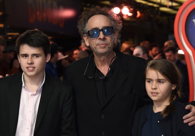 <p>Stuart C. Wilson/Getty </p> Tim Burton, with his children Billy and Nell attend the 'Dumbo' European premiere on March 21, 2019 in London, England.