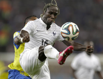 France&#39;s Bacary Sagna clears the ball ahead of Ecuador&#39;s Alex Ibarra during the group E World Cup soccer match. (AP)