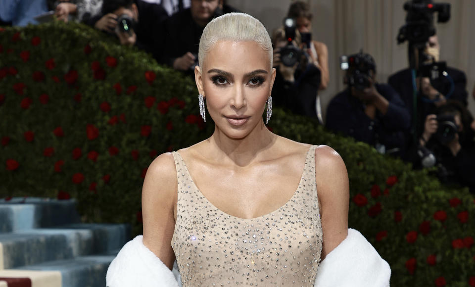 Kim Kardashian wearing Marilyn Monroe's iconic dress to the Met Gala has caused controversy. (Getty Images)