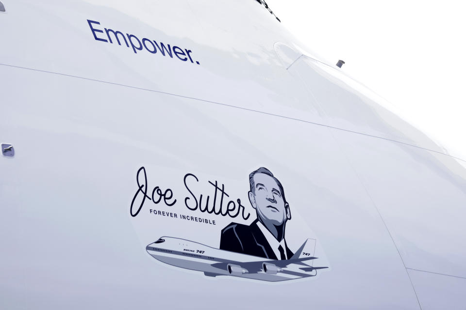 An illustration on the side of the final Boeing 747 commemorates Joe Sutter, who was the chief engineer in creating the jumbo jet over 50 years ago, is seen during a ceremony for the delivery of the final Boeing 747 jumbo jet, Tuesday, Jan. 31, 2023, in Everett, Wash. (AP Photo/John Froschauer)