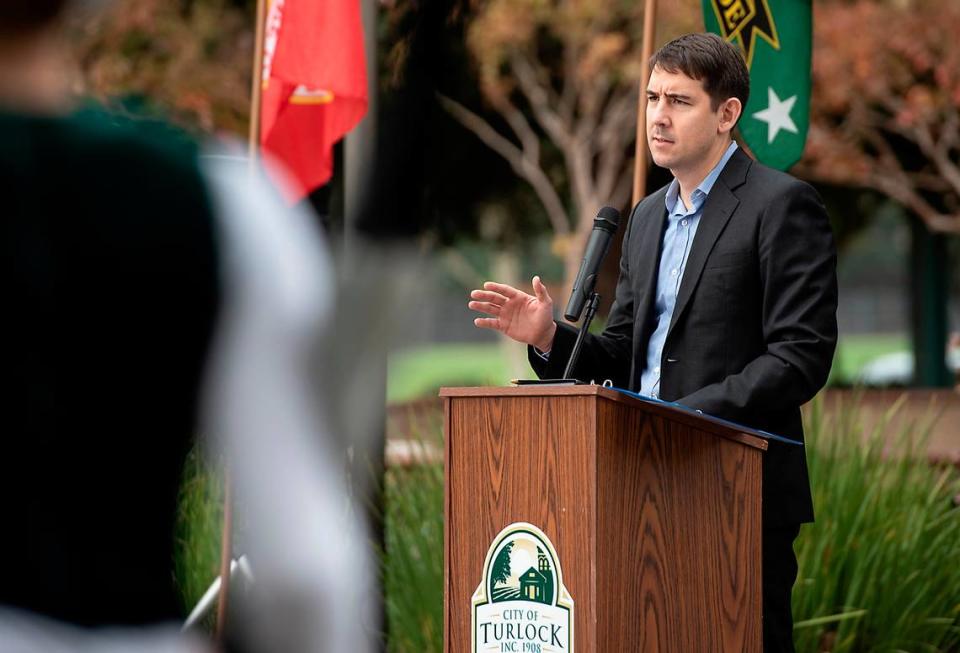 Congressman Josh Harder speaks to a small crowd during City of Turlock’s Veterans Day ceremony at the Turlock Regional Sports Complex in Turlock ,Calif., on Thursday, Nov. 11, 2021.