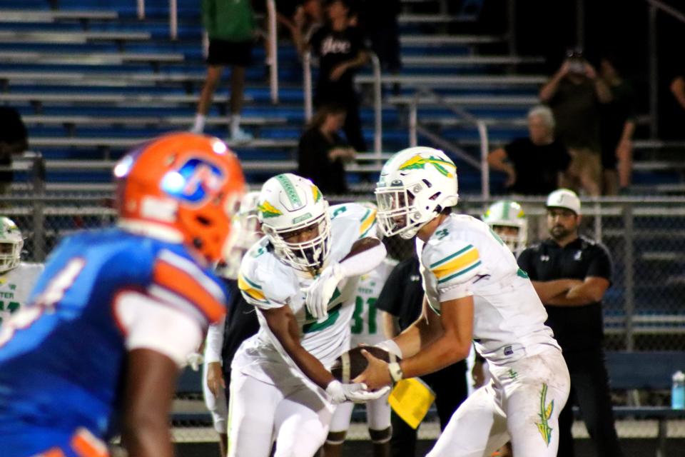 The Gators (5-4) fell, 42-20, as Jupiter rolled to 8-1 with a historic district championship win at Palm Beach Gardens High on Thursday, Oct. 26, 2023.