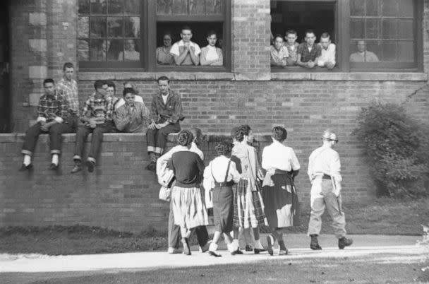 PHOTO: Members of the Little Rock Nine walk into Little Rock Central High School on Oct. 16, 1957, after the Supreme Court ordered the end of 'separate but equal' schools in the landmark Brown v. Board of Education decision. (Bettmann Archive via Getty Images, FILE)