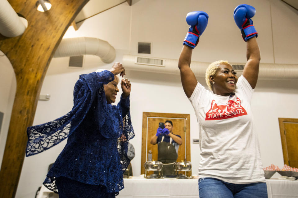 Sen. Louise Lucas, left, celebrates her win for Virgina's 18th District State Senate Democratic nomination with her daughter, Theresa Lucas, at Bide-A-Wee golf course in Portsmouth, Va. on Tuesday, June 20, 2023. (Kendall Warner/The Virginian-Pilot via AP)