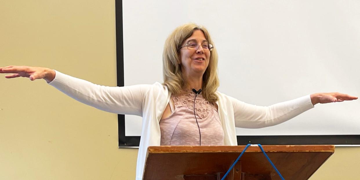 Melissa Allen-Dumas speaks on climate change effects on people to the League of Women Voters of Oak Ridge.