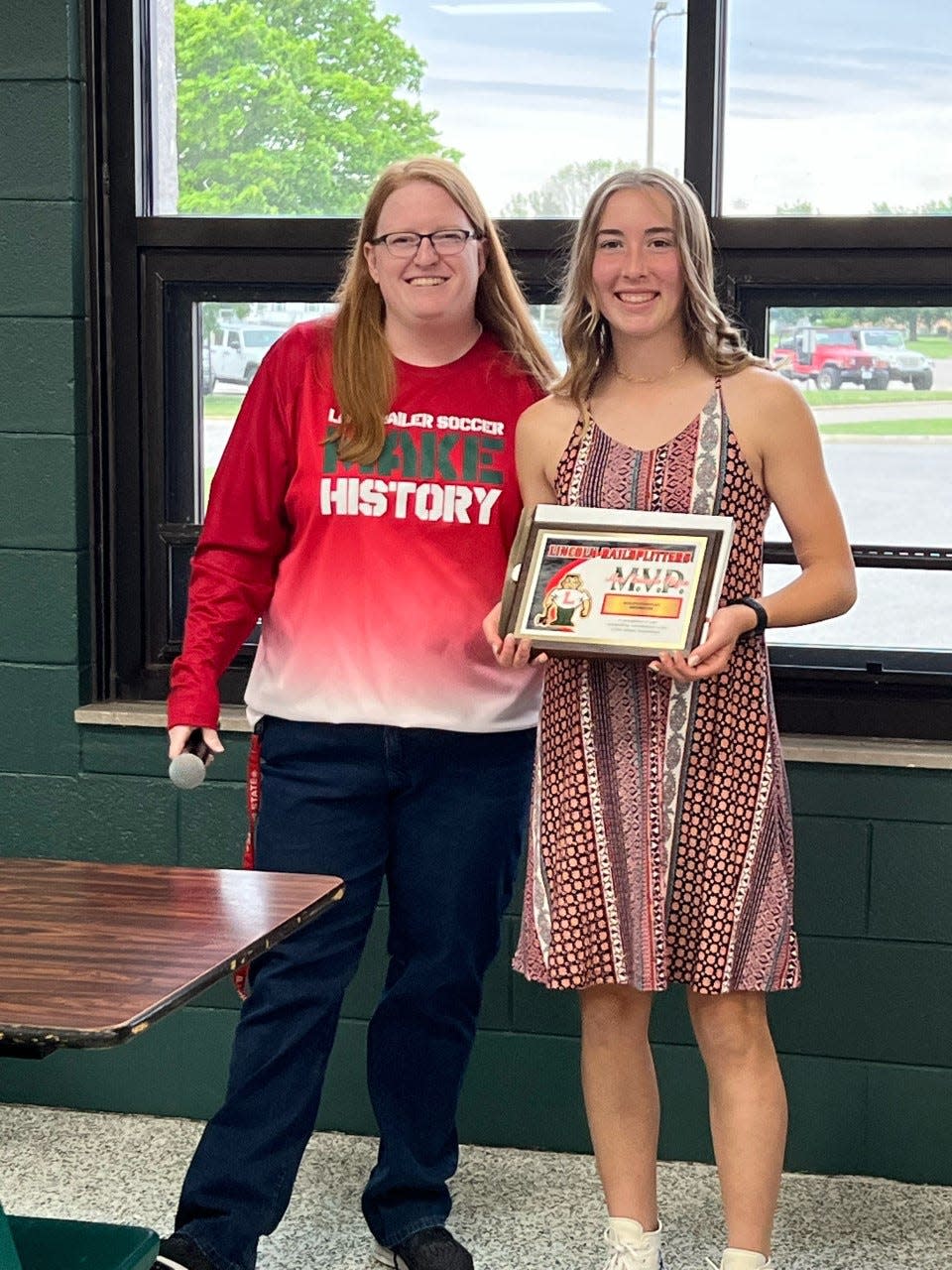 Hattie Mourning, right,  was named as the Most Valuable Player and also honored for making Apollo All Conference 2nd team. Head Coach Beth Rayman is on the left.