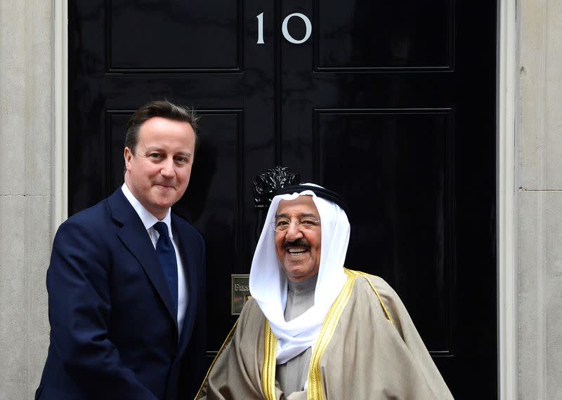 FILE PHOTO: Britain's Prime Minister David Cameron greets Kuwait's Emir Sheikh Sabah al-Ahmad al-Sabah outside 10 Downing Street in London