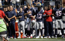 <p>New England Patriots head coach Bill Belichick, left, and Tom Brady (12) Phillip Dorsett (13) Matthew Slater, second from right, and David Harris (45) stand during the national anthem before an NFL football game against the Houston Texans, Sunday, Sept. 24, 2017, in Foxborough, Mass. (AP Photo/Steven Senne) </p>