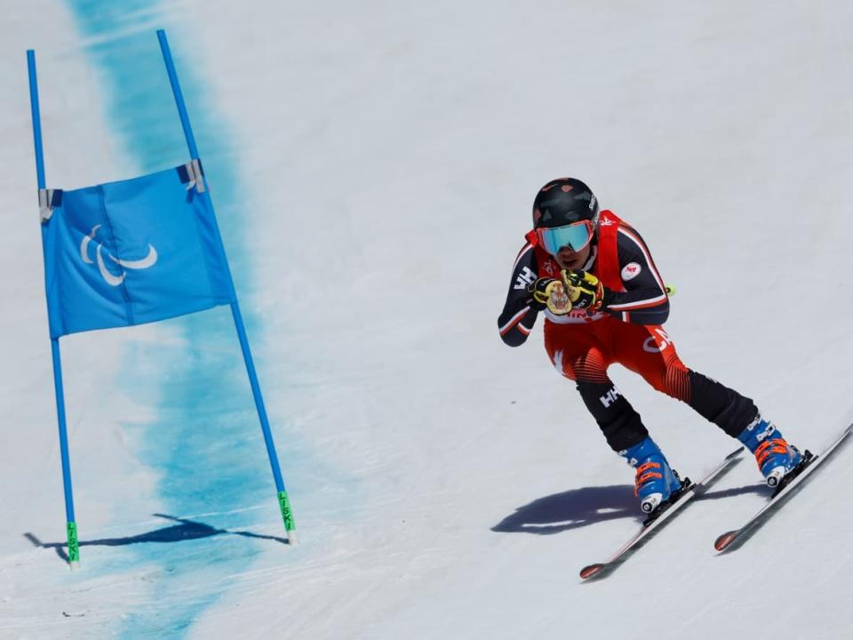 Alexis Guimond, pictured competing at the 2022 Beijing Paralympics, took placed third in the men's standing giant slalom on Thursday in St. Moritz, Switzerland. (Christian Petersen/Getty Images - image credit)