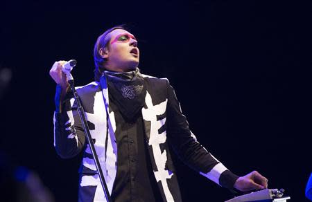 Lead vocalist Win Butler of rock band Arcade Fire performs at the Coachella Valley Music and Arts Festival in Indio, California April 13, 2014. REUTERS/Mario Anzuoni