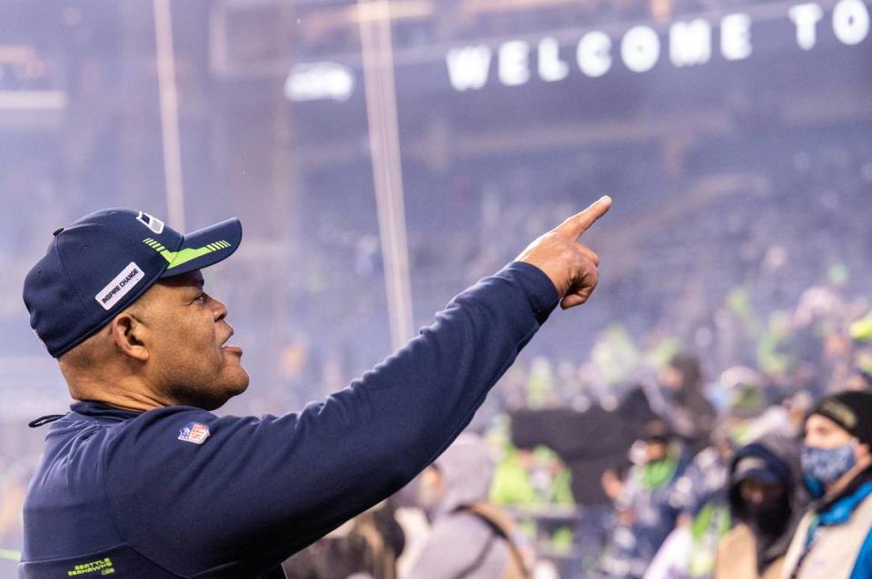 Seahawks defensive coordinator Ken Norton Jr., points to the stands as he walks off the field after Seattle beat Detroit, 51-29, in a week 17 NFL game on Sunday, Jan. 2, 2022, at Lumen Field in Seattle, Wash.