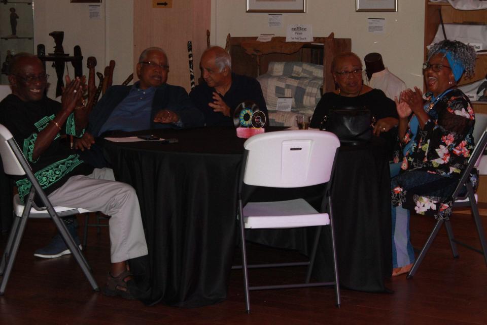 Members of the audience enjoy each other's company at a table during the Boogie Woogie Rock N Roll Dance Party fundraising event at the Cotton Club Museum & Cultural Center on Friday night in SE Gainesville.
(Credit: Photo by Voleer Thomas/For The Guardian)