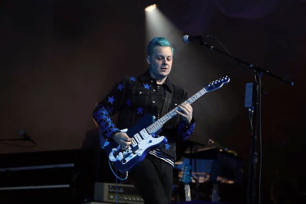 Jack White performs at the Masonic Temple in Detroit on Friday. He surprised fans by marrying musician Olivia Jean on stage during his Detroit homecoming show. (Photo: via Associated Press)