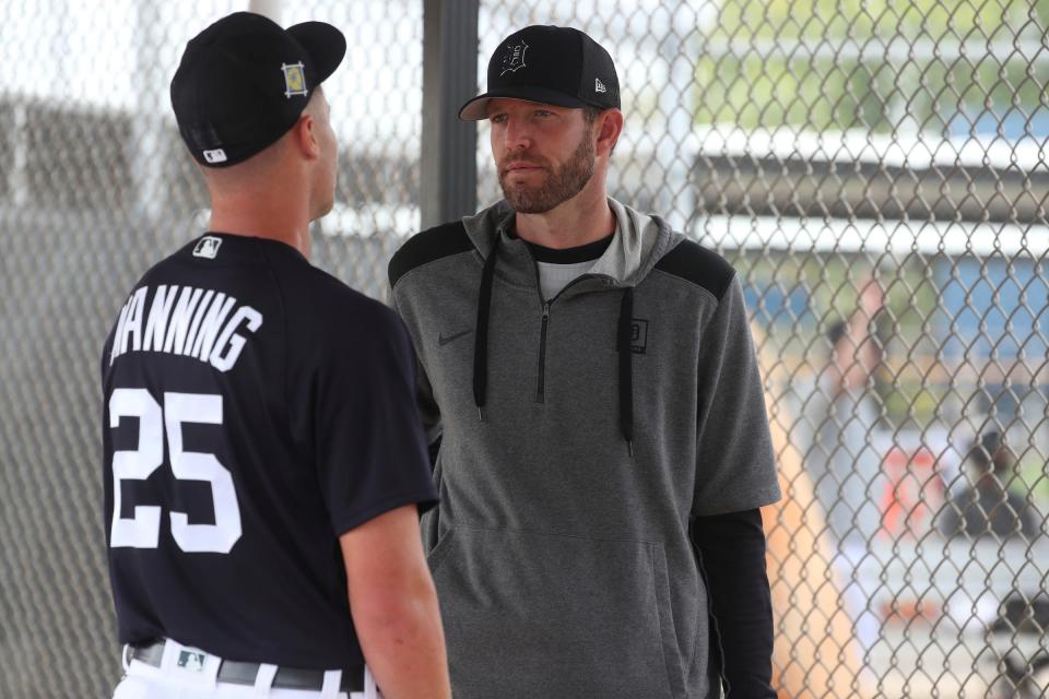 Tigers pitcher Matt Manning talks with pitching coach Chris Fetter after live batting practice during Detroit Tigers spring training on Wednesday, March 16, 2022, at TigerTown in Lakeland, Florida.