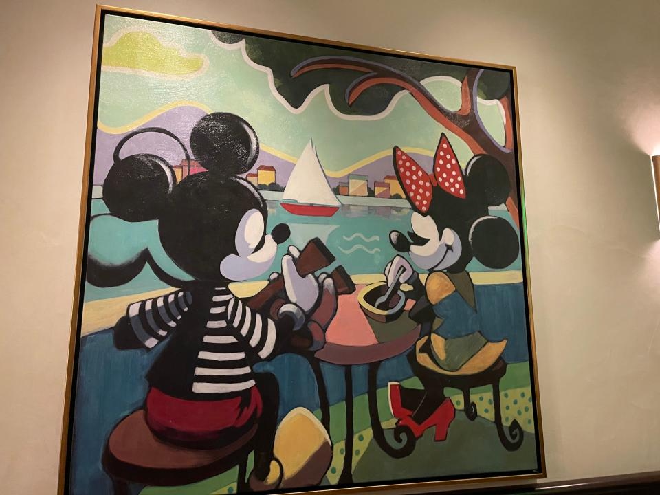 Artwork of Mickey and Minnie Mouse in Topolino's Terrace