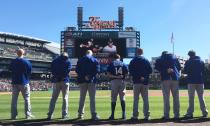 <p>Billy Burns #14 of the Kansas City Royals and teammates bow their heads in a moment of silence for Miami Marlins pitcher Jose Fernandez, who was killed early Sunday in a boating accident in Florida, before a game against the Detroit Tigers at Comerica Park on September 25, 2016 in Detroit, Michigan. (Photo by Duane Burleson/Getty Images) </p>