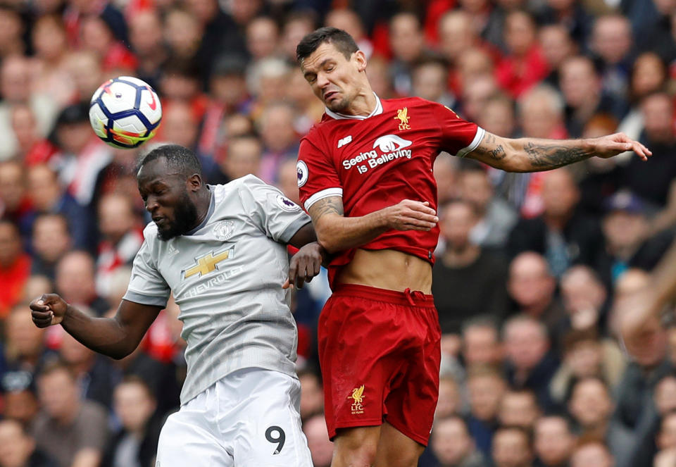 <p>Manchester United’s Romelu Lukaku gets the better of Dejan Lovren</p>