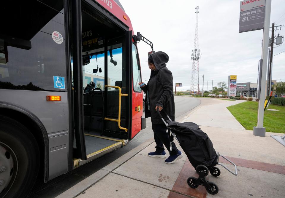 Irene Ray gets on the bus with her groceries to return to Del Valle. If traffic flows well, each half of the bus trip to and from her preferred H-E-B can be completed in an hour and a half.