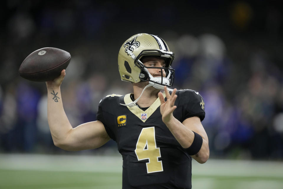 New Orleans Saints quarterback Derek Carr warms up before the start of an NFL football game against the New York Giants Sunday, Dec. 17, 2023, in New Orleans. (AP Photo/Gerald Herbert)