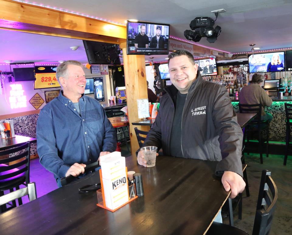 L Street owners Terry Daidone, left, and Jake Magro say a website published a story recently that said the tavern was closing. In reality, L Street Tavern in Boston is being sold, but L Street in Hampton is still open.