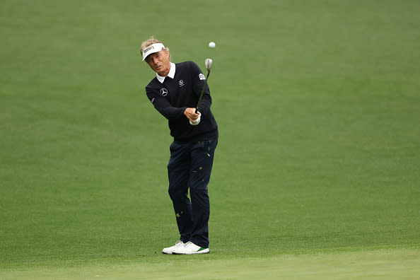 Bernhard Langer chips for the green on Day Two at the Masters