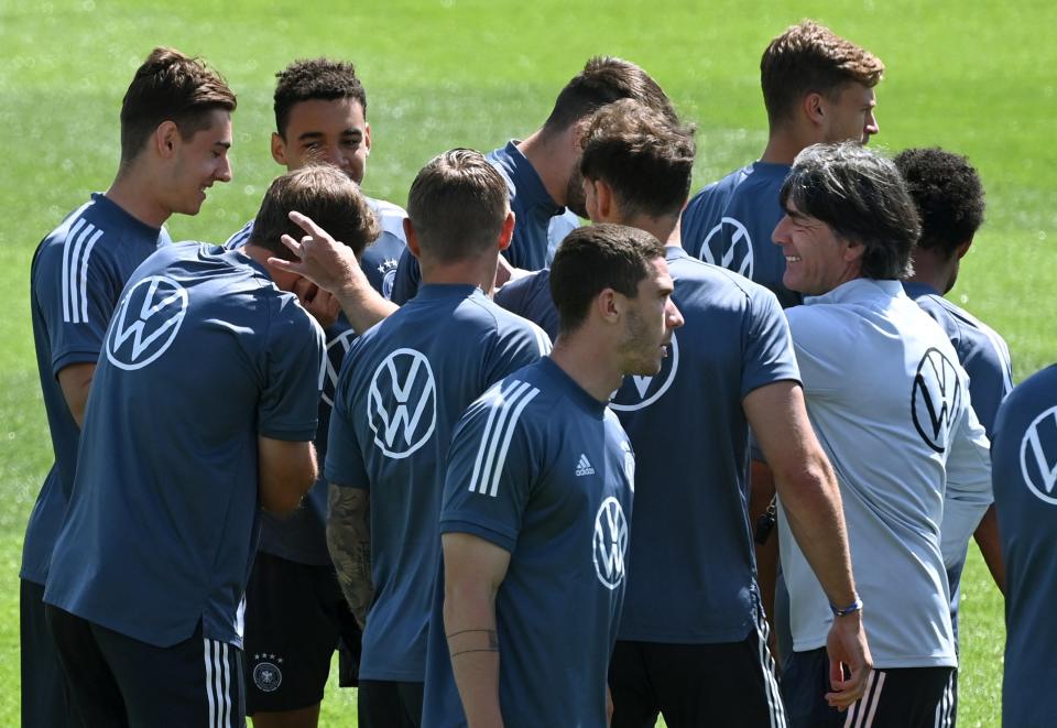 Löw enjoys a better relationship with his players than many outsiders believe (AFP via Getty Images)