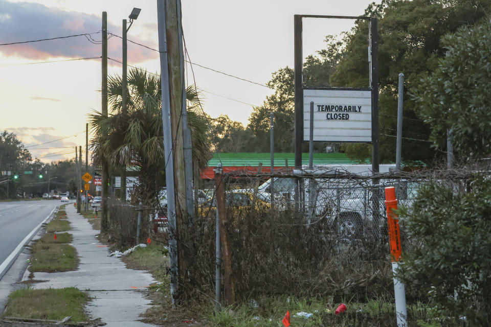 A sign for a closed business in an area impacted by a local gerrymandering case in Jacksonville, Fla., Jan. 30, 2023. A protracted legal fight over how city council districts were drawn in Jacksonville, Florida, reflects an aspect of redistricting that often remains in the shadows. Political map-drawing for congressional and state legislative seats captures wide attention after new census numbers are released every 10 years. No less fierce are the battles over the way voting lines are drawn in local governments, for city councils, county commissions and even school boards.(AP Photo/Gary McCullough)