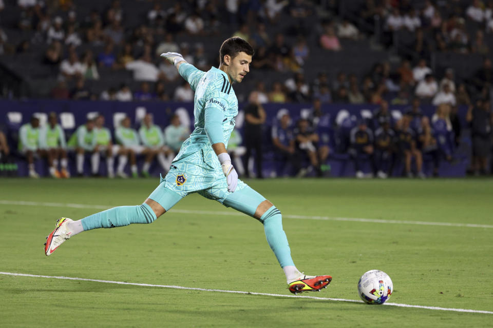 Los Angeles Galaxy goalkeeper Jonathan Bond kicks the ball during the first half of an MLS soccer match against the Vancouver Whitecaps, Saturday, Aug. 13, 2022, in Carson, Calif. (AP Photo/Raul Romero Jr.)