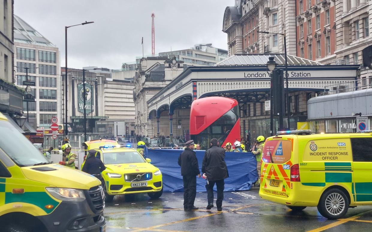Ambulances surround Victoria station after a pedestrian was hit by a bus