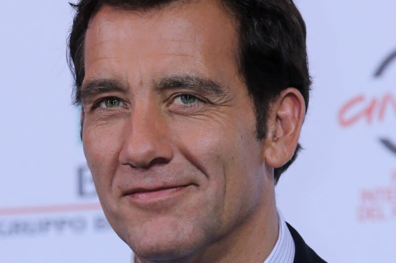 Clive Owen arrives at a photo call for the TV Series "The Knick" during the 9th annual Rome International Film Festival in 2014. File Photo by David Silpa/UPI